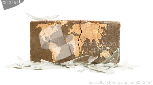 Image of Brick with broken glass, violence concept