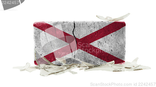 Image of Brick with broken glass, violence concept