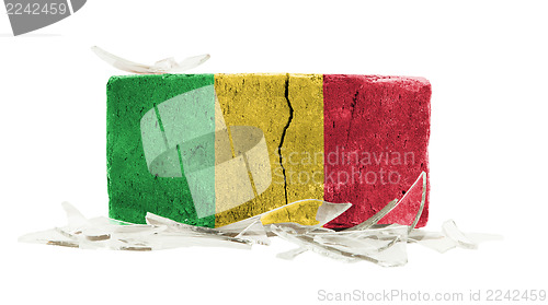 Image of Brick with broken glass, violence concept