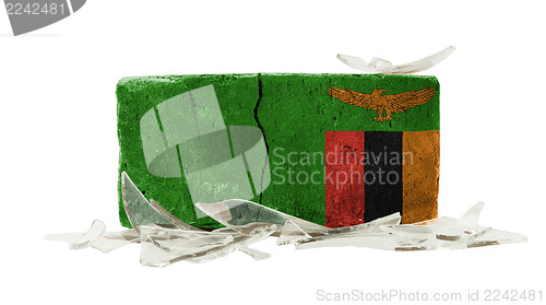 Image of Brick with broken glass, violence concept