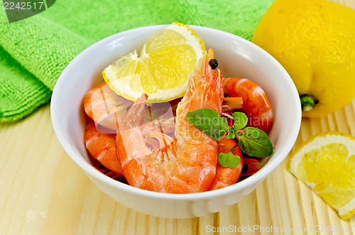 Image of Shrimp in a white bowl with lemon slices