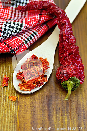 Image of Pepper red hot chili with a napkin on board