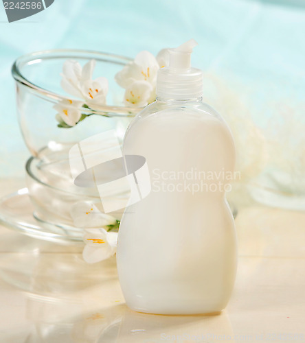 Image of Full bottle of white dish washing