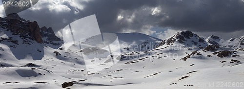 Image of Panorama of snowy mountains before storm