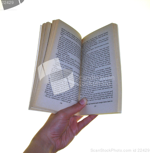 Image of Holding a book open