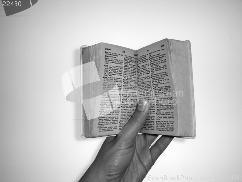 Image of Holding a book open