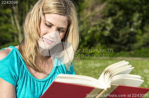 Image of Close-up Of Woman Reading Book