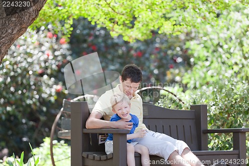 Image of family of two laughing