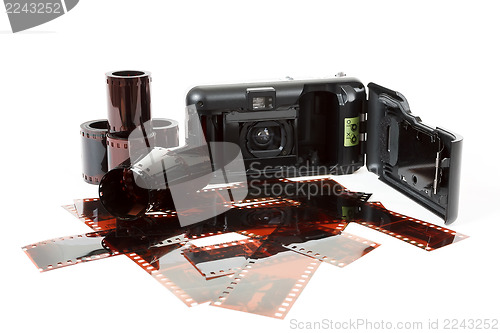 Image of analog photo camera and color negative films