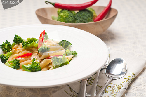 Image of Italian penne pasta with broccoli and chili pepper