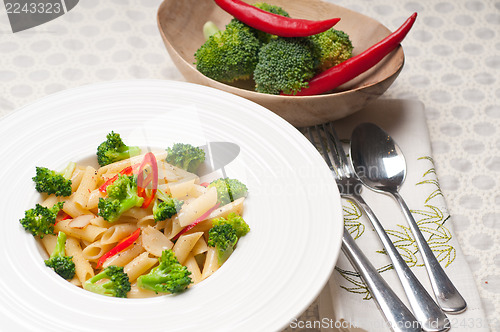 Image of Italian penne pasta with broccoli and chili pepper