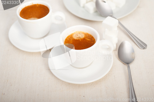 Image of Italian espresso coffee and sugar cubes