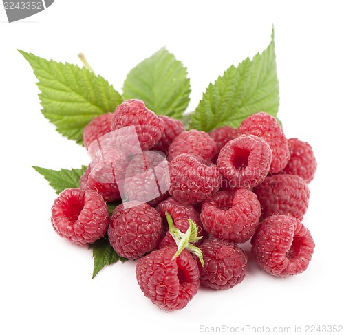 Image of Ripe raspberry with green leaf