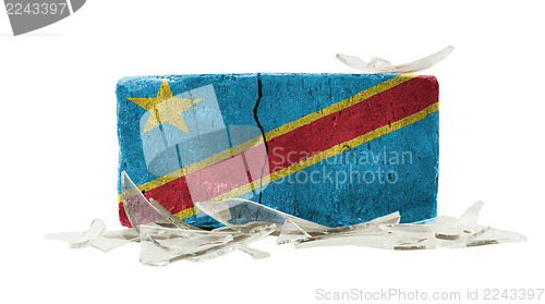 Image of Brick with broken glass, violence concept