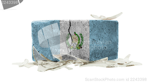 Image of Brick with broken glass, violence concept