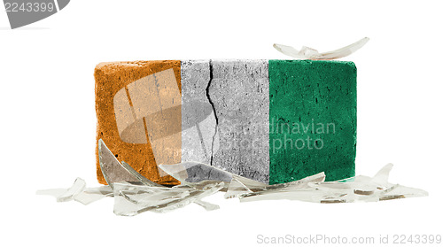 Image of Brick with broken glass, violence concept