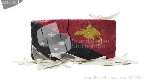 Image of Brick with broken glass, violence concept