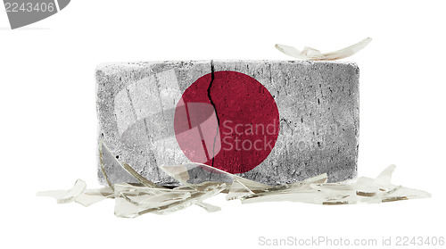 Image of Brick with broken glass, violence concept