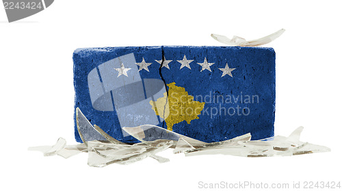 Image of Brick with broken glass, violence concept