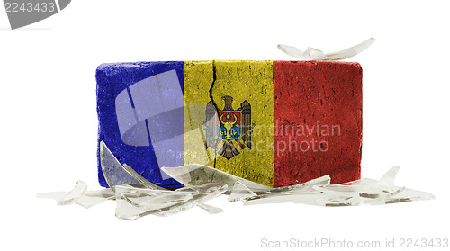 Image of Brick with broken glass, violence concept