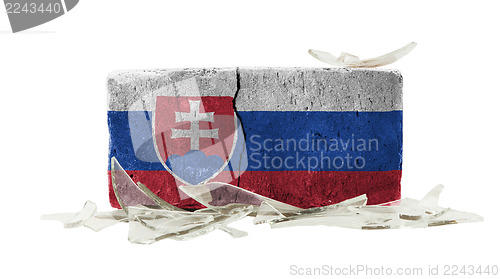 Image of Brick with broken glass, violence concept