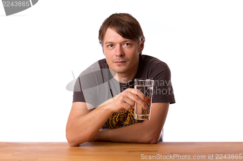 Image of Man with a glass of water