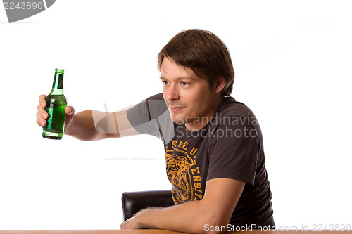 Image of Man with a bottle of beer