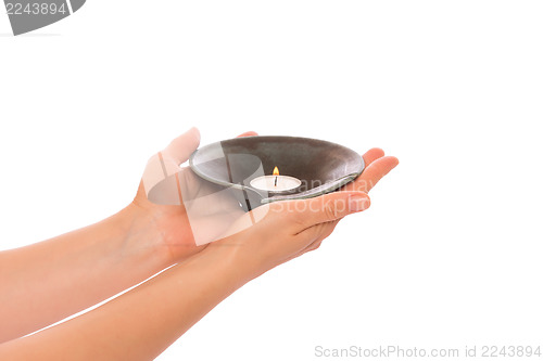Image of Candle in the hands