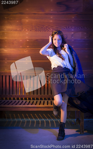 Image of Mixed Race Young Adult Woman Portrait Against Wooden Wall