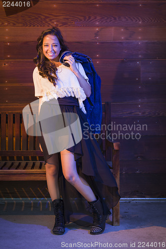 Image of Mixed Race Young Adult Woman Portrait Against Wooden Wall