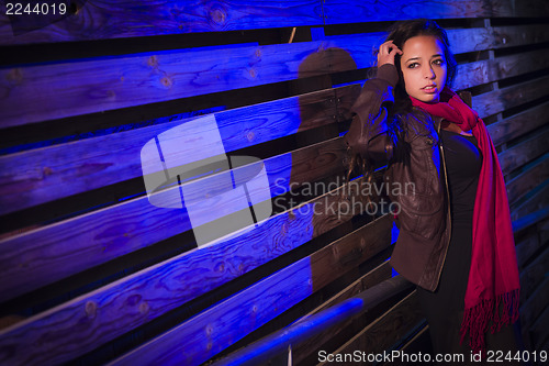 Image of Mixed Race Young Adult Woman Against a Wood Wall Background