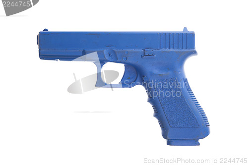 Image of Dirty blue training gun isolated on white