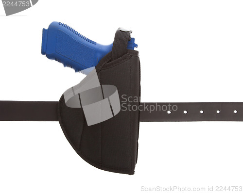Image of Dirty blue training gun isolated on white