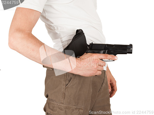 Image of Close-up of a man with holster and a gun