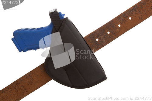 Image of Dirty blue training gun isolated on white