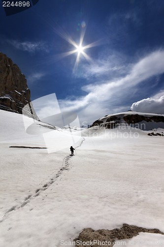 Image of Hiker in snowy mountains