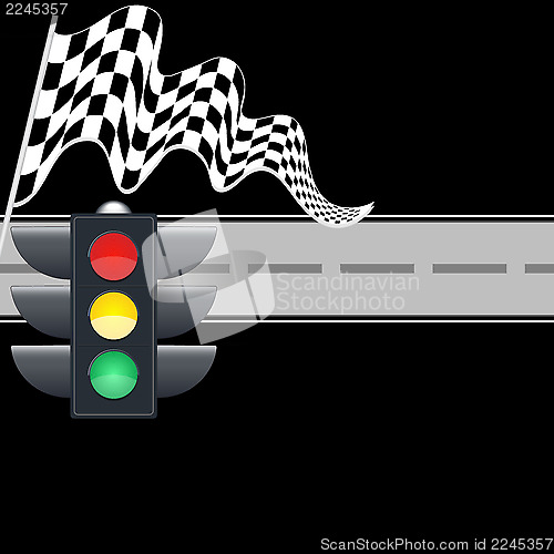 Image of Traffic light with checkered flag and road