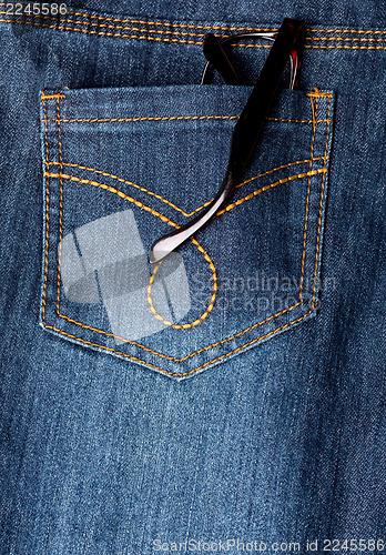 Image of Eyeglasses in back pocket of jeans