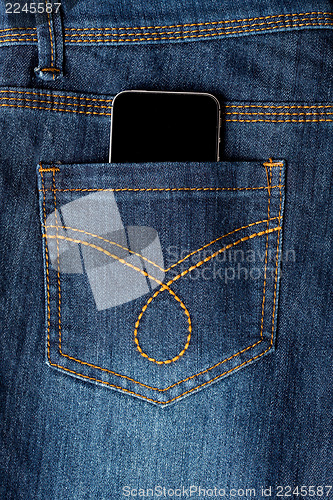 Image of Cellphone in jeans pocket