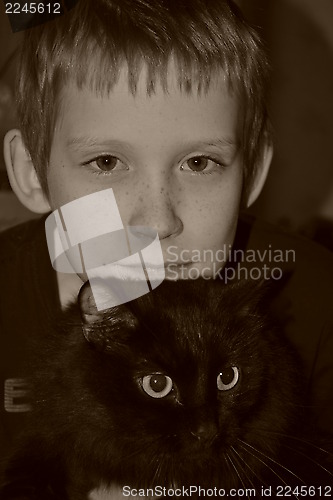 Image of the boy and the cat