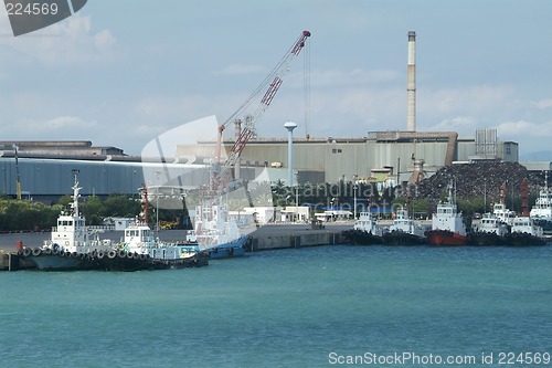 Image of Tugboats at an industrial harbour