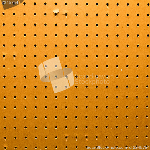 Image of Peg board texture closeup