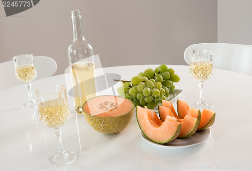 Image of White wine with fruits