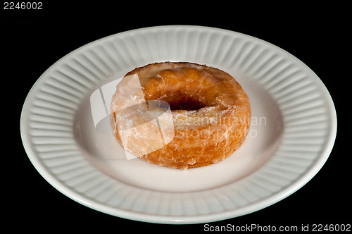 Image of Glazed Donut Isolated on a Black Background