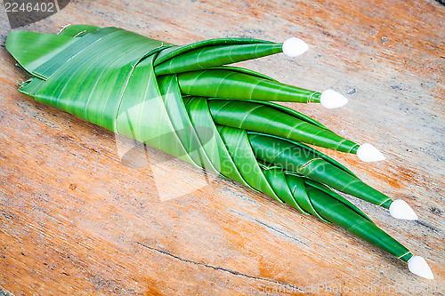 Image of Handmade banana leaf rice offering prepare for worship