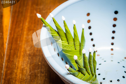 Image of Close up banana leaf rice offering in the basket 