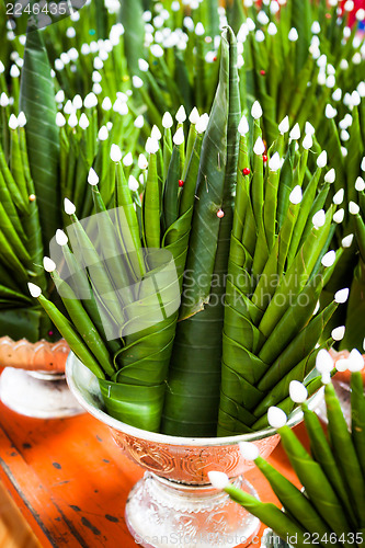 Image of Handicraft banana leaf rice offering in metal tray