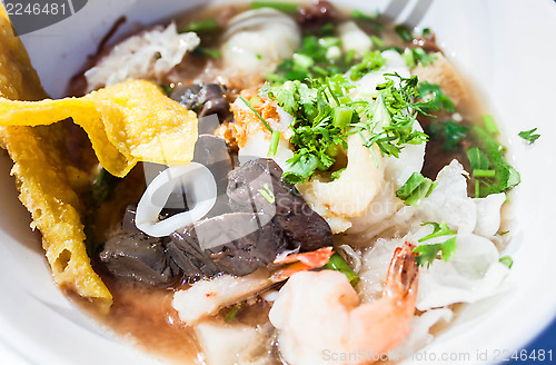 Image of Close up thai noodle style with red tofu 