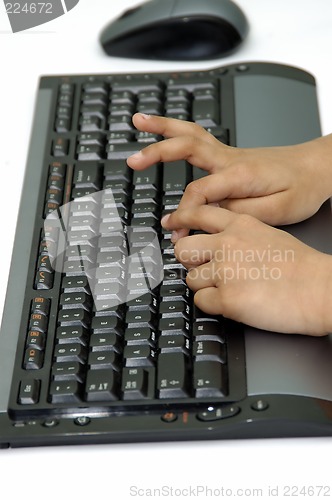 Image of Hands typing on a computer key board