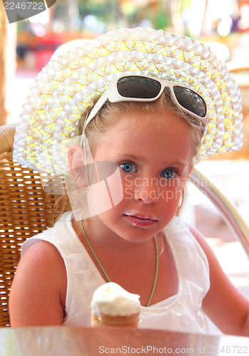 Image of cute little girl with ice-cream